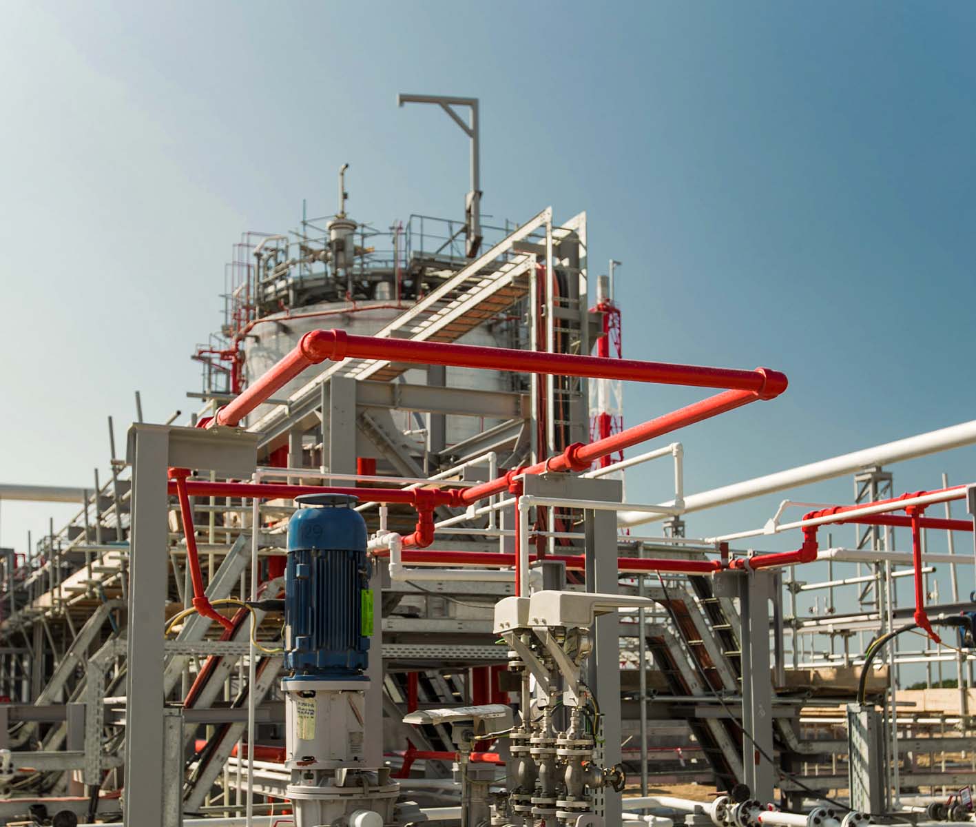 Process facility with piping systems